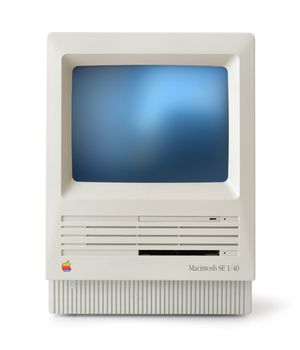 Original classic Apple Macintosh SE computer front, isolated on white