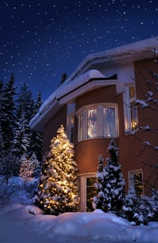 Idyllic Christmas time house in blue winter evening moment