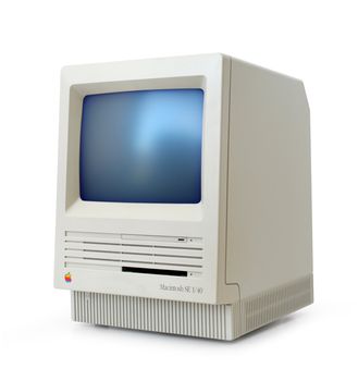 Original classic Apple Macintosh SE computer isolated on white