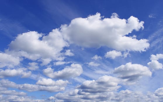 Dramatic cloudscape blue sky white clouds background