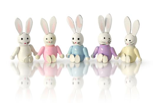 Funny easter bunny figures in a row holding hands