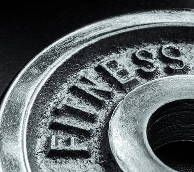 Iron text of the word fitness