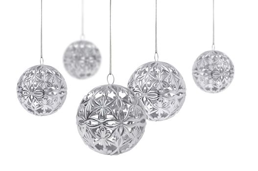 Shiny silver Christmas ball hanging, isolated on white background