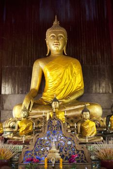 Buddha statue inside Wat Phan Tao temple in Chiang Mai Thailand. It is one of the oldest temple in Chiang Mai built in 1846