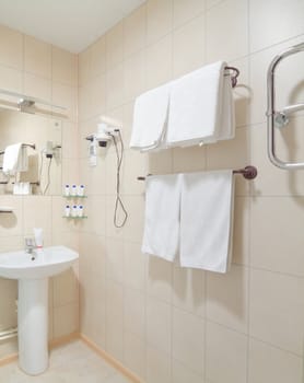 Wash-room interior with white ceramics