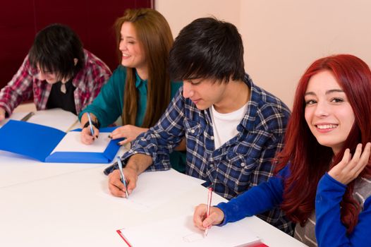 College students at a desk 