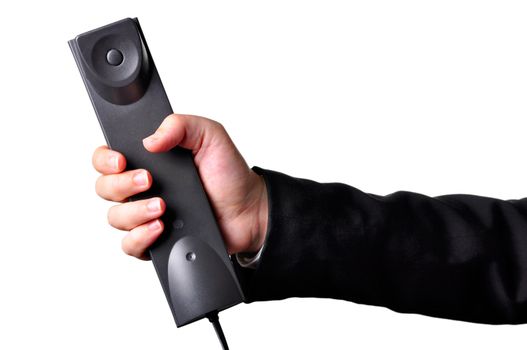 Businessperson in suit holding a phone handset