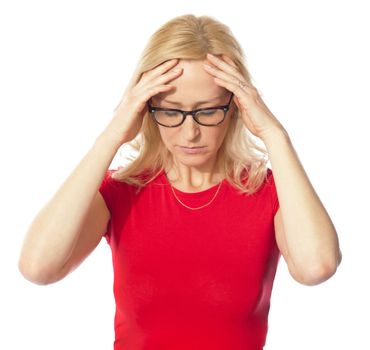 A picture of a frustrated woman holding her head over white background