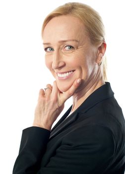 Corporate woman posing with finger on her face isolated over white backgroung