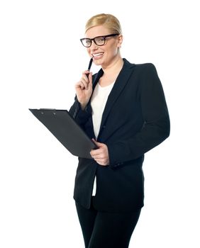 Portrait of smiling mischievous female executive isolated on white background