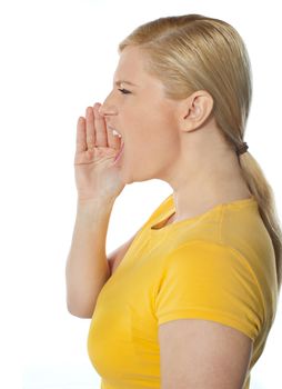 Side view of shouting teenager isolated over white background