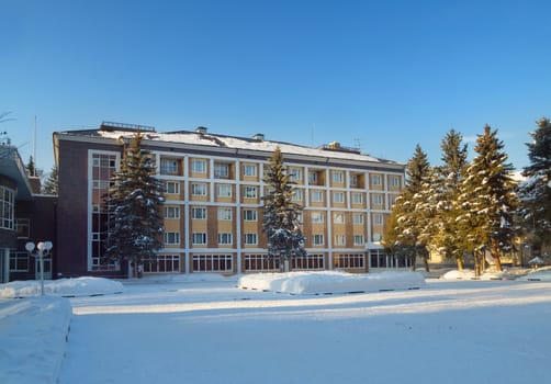 Hotel building with clear blue sky on winter day