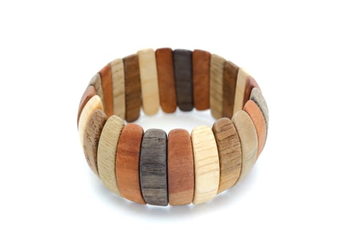 handmade wooden bracelet over white background