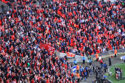 LONDON - APRIL 14 : Supporters watch the football game of Liverpool - Everton Semi Final FA Cup Crowd at Wembley Arena Staduim on April 14, 2012 in London, England United Kingdom.