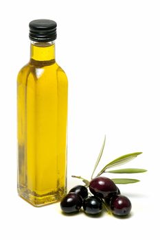 olive oil and fresh olives on white background