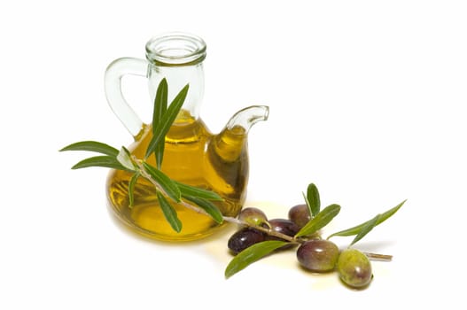 olive oil and fresh olives on white background