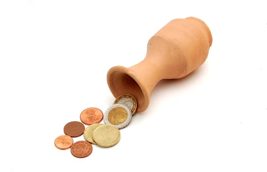 euro coins and jug
