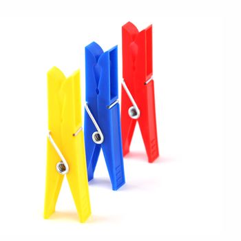 colored clothespins isolated on white background