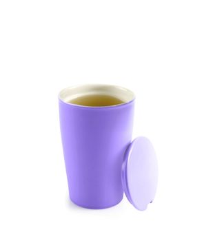 tea in thermos mug isolated on white