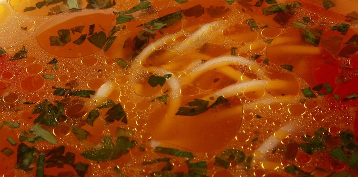 Close-up of soup with noodles