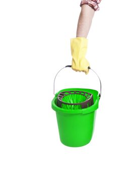 Human hand holding empty plastic bucket container