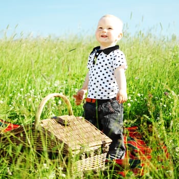  picnic on green grass boy and basket