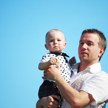 happy family blue sky on background