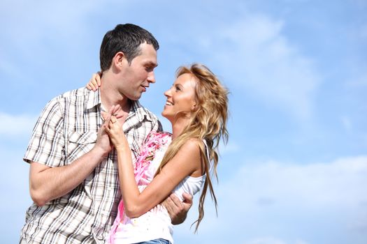 man and woman dance in the sky