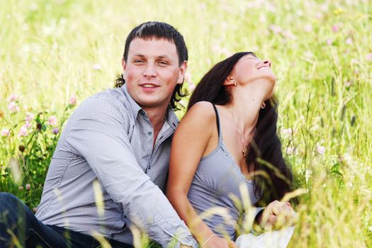 two lovers on grass field