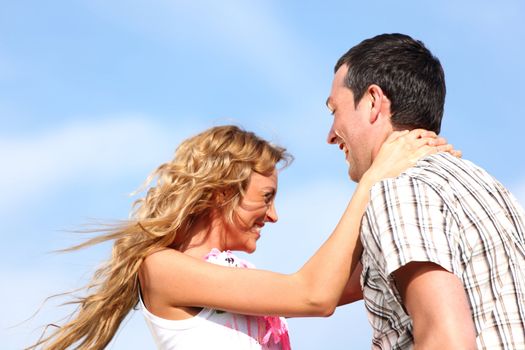 man and woman dance in the sky
