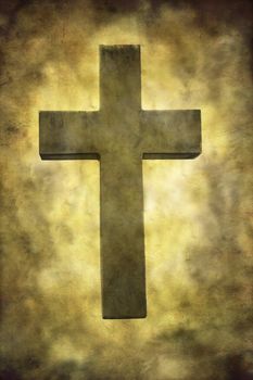 A stone cross textured in a grungy style. 