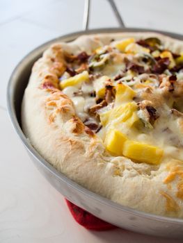 Sausage, pineapple and cheese panpizza