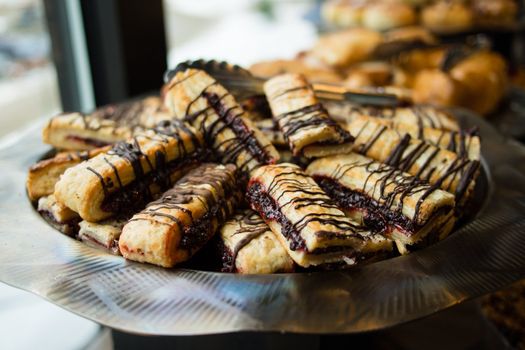 Chocolate and raspberry puff pastries