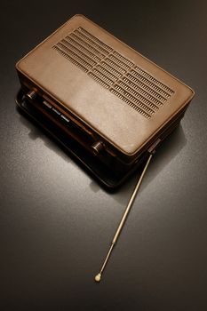 an old vintage radio in dramatic lighting.