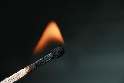 Picture of a burning matchstick