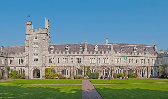 CORK, IRELAND - MARCH 26: students attending University at the Main Quadrangle on March 26, 2012 in Cork, Ireland. UCC was named Irish University of the year by The Sunday Times in 2003, 2005 and 2011