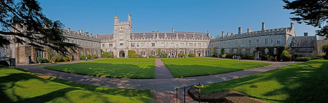 CORK, IRELAND - MARCH 26: students attending University at the Main Quadrangle on March 26, 2012 in Cork, Ireland. UCC was named Irish University of the year by The Sunday Times in 2003, 2005 and 2011