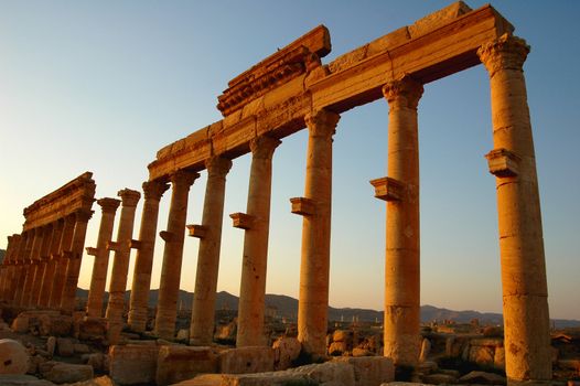 Relics Palmyra in Syria against blue sky. Ancient Roman time town in Palmyra (Tadmor), Syria.