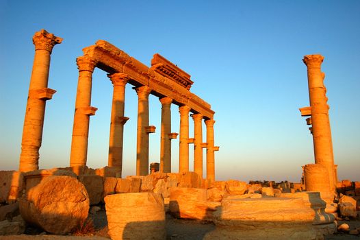 Relics Palmyra in Syria against blue sky. Ancient Roman time town in Palmyra (Tadmor), Syria.