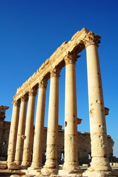 Relics Palmyra in Syria against blue sky. Ancient Roman time town in Palmyra (Tadmor), Syria.
