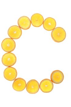 citrus fruits in sclices forming a C for Vitamin C