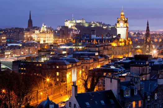 Edinburgh Skylines building and castle from Calton Hill at dusk Scotland UK