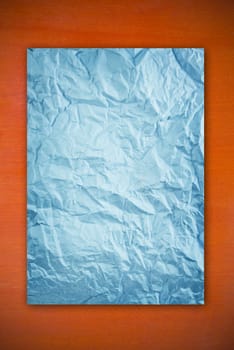 crumpled paper on the wood pattern