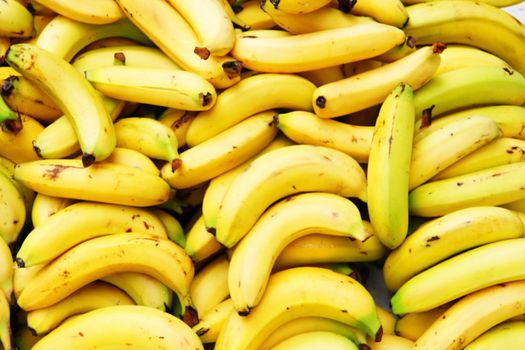 A close-up of many bananas