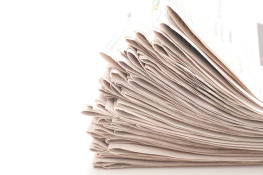 close-up of newspapers/magazine on a white backgroung.
