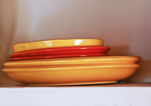 still life display of clay plates and bowls used in middle eastern dining