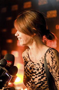 Mumbai, India - December 10, 2011: Editorial - Portrait of Kalki Koechin Bollywood actress, profile view of her being interviewed at a Publicity event