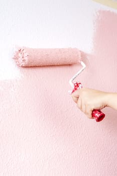 painting a wall in pink