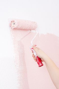 painting a wall in pink