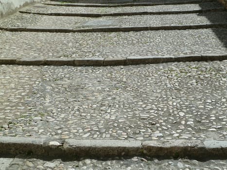 old cobbled steps in bright sunlight